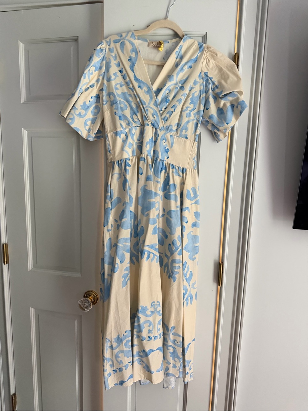 Cream Midi Dress with Light Blue Floral Pattern and V-Neck